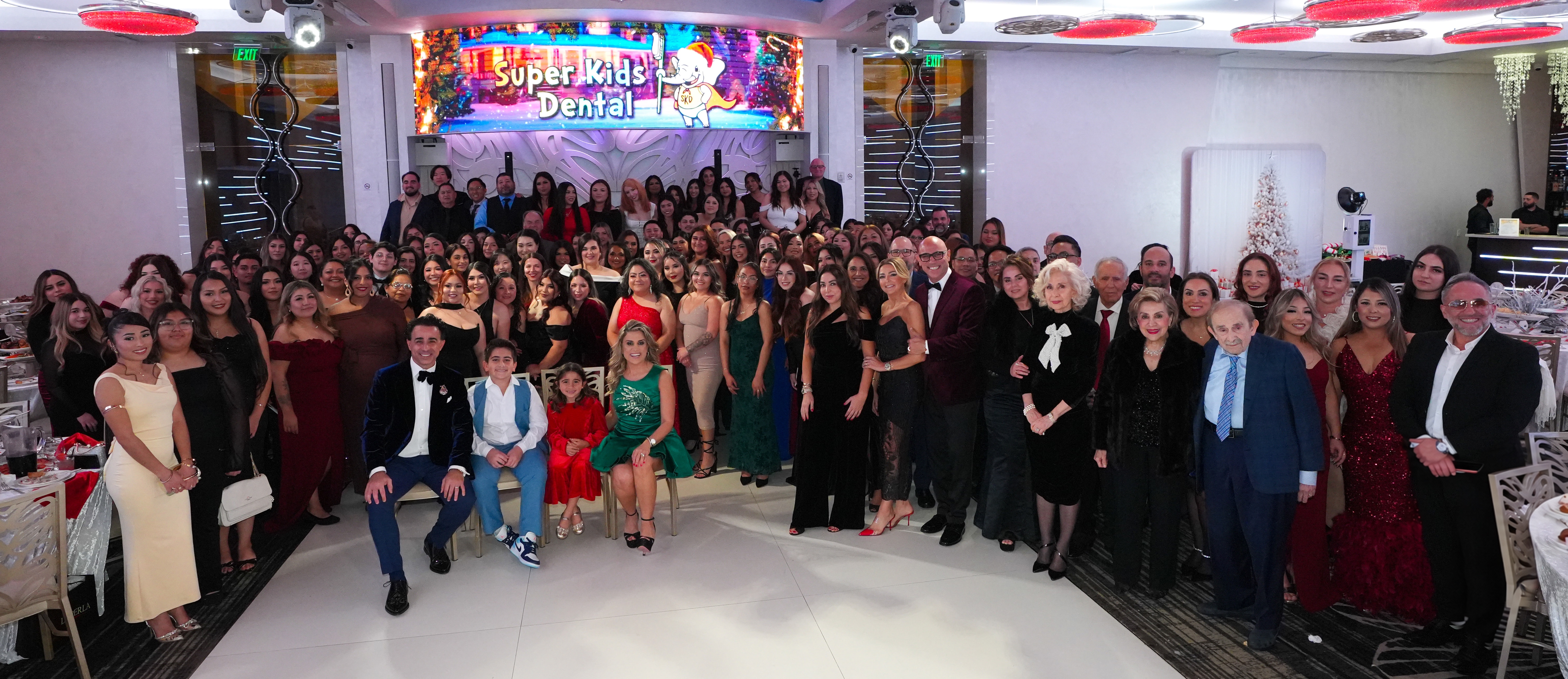 Super Kids Dental team gathered together at a company celebration